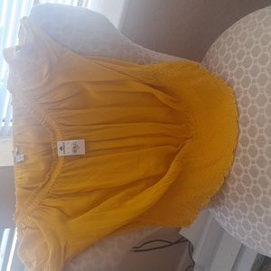 Mustard beautiful blouse. Brand new. Never worn